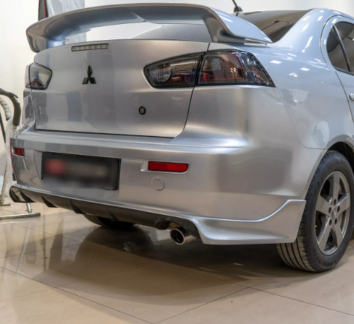 Юбка заднего бампера Zodiac Mitsubishi Lancer 10 - Под одинарную выхлопную систему