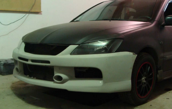 Бампер передний EVO для Mitsubishi Lancer 9