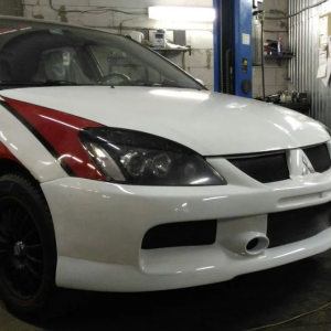 Бампер передний EVO для Mitsubishi Lancer 9