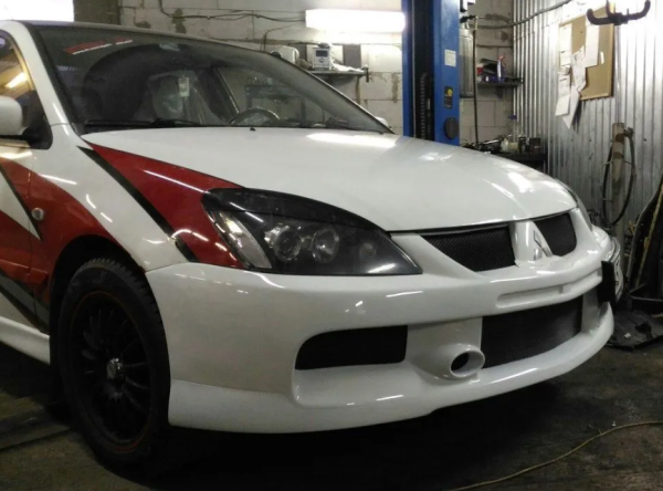 Бампер передний EVO для Mitsubishi Lancer 9