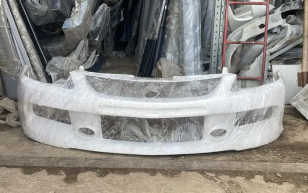 Бампер передний EVO для Mitsubishi Lancer 9